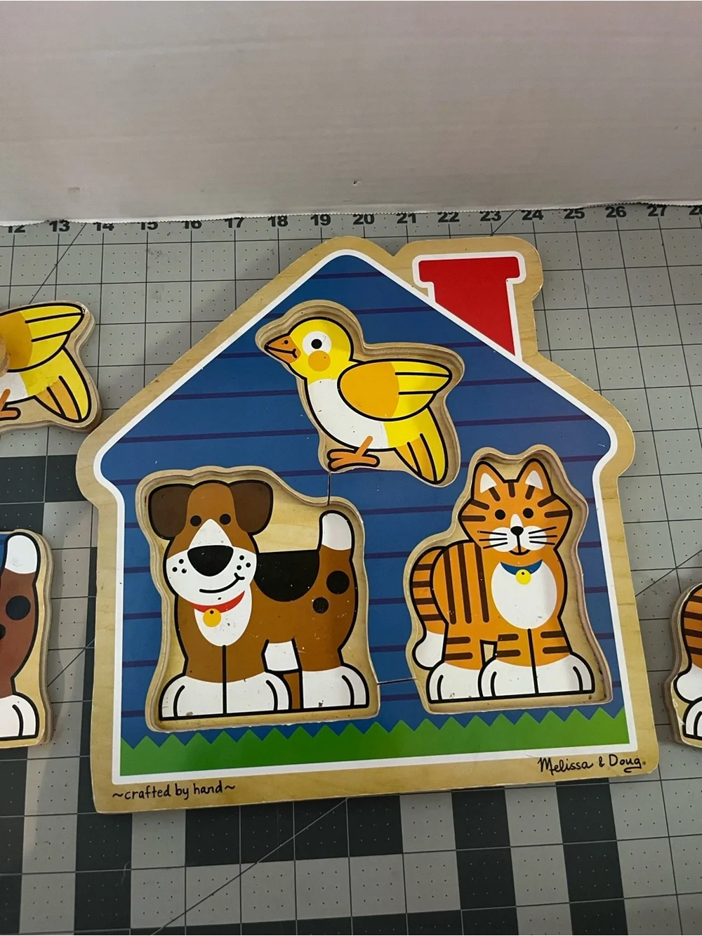 Melissa & Doug Wooden House Peg Puzzle with Blue, Yellow, Brown, Orange